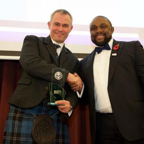 Matthew Dashper Hughes receiving Moderator of the Year