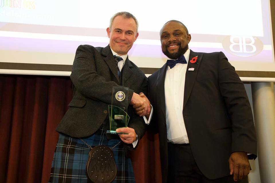 Matthew Dashper Hughes receiving Moderator of the Year