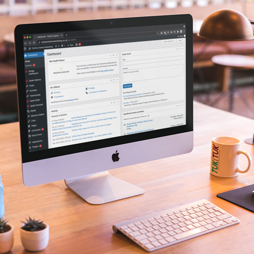 A Wordpress website dashboard displayed on a Mac computer A Wordpress website dashboard displayed on a Mac computer