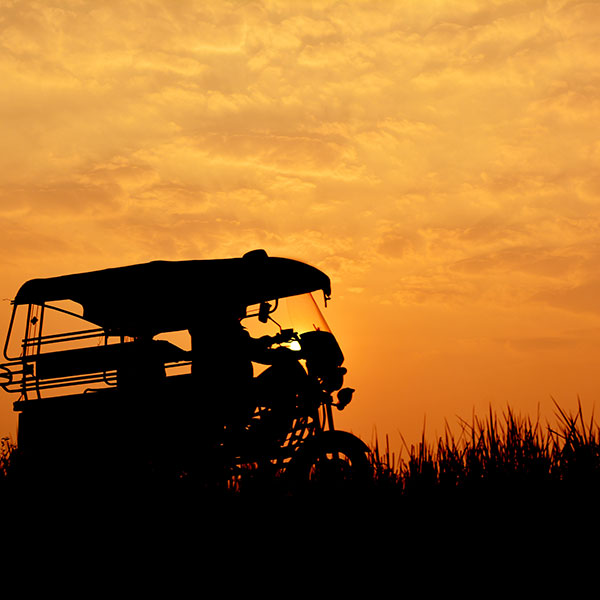 tuktuk-sunset-thailand A TukTuk parked up at sunset in Thailland