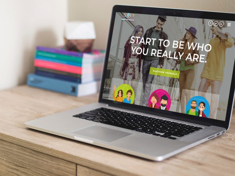 Back on Track Teens website displayed on a Macbook Air sat on a desk.