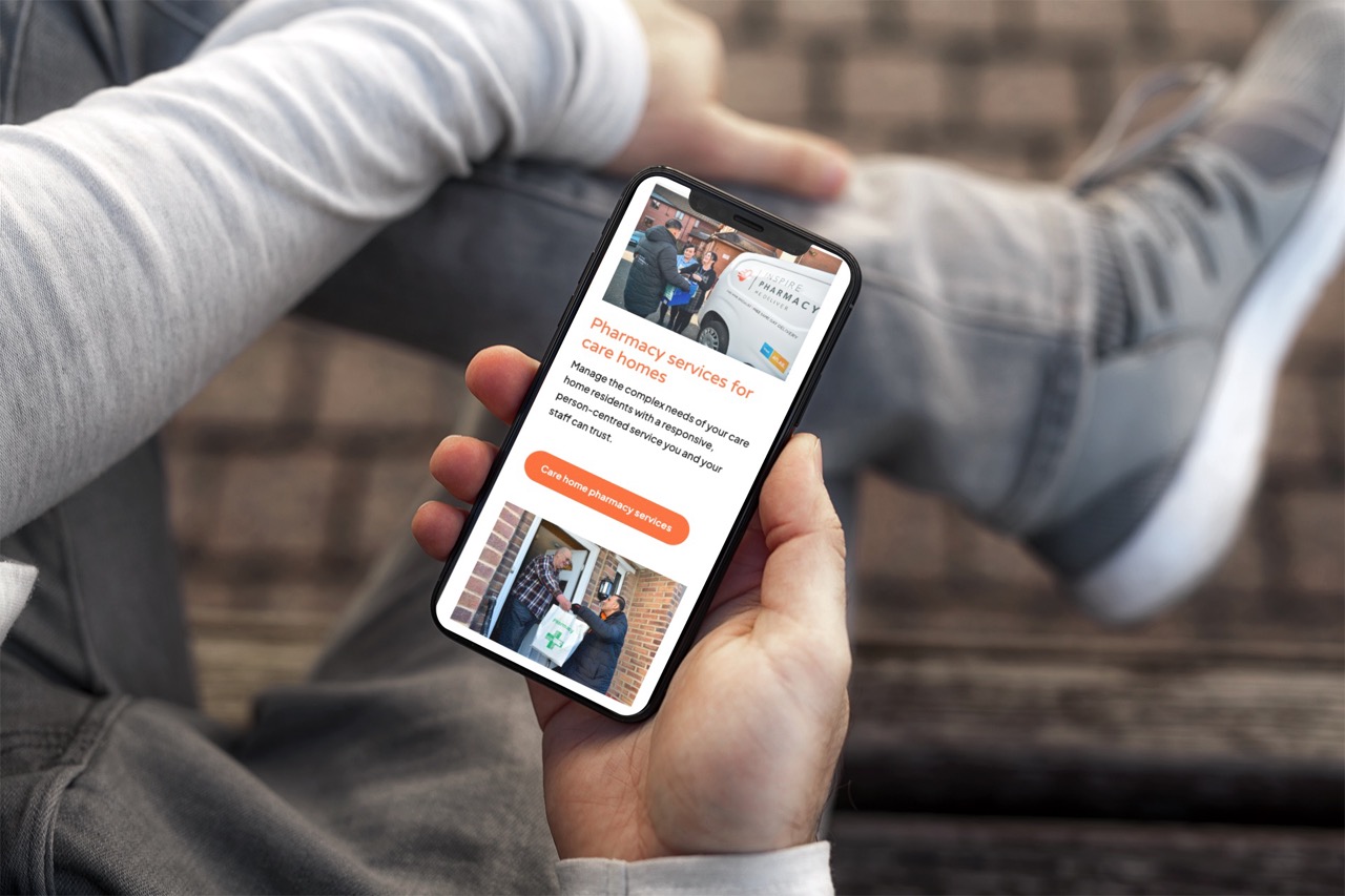 Inspire Pharmacy's website Inspire Pharmacy's website displayed on a mobile phone